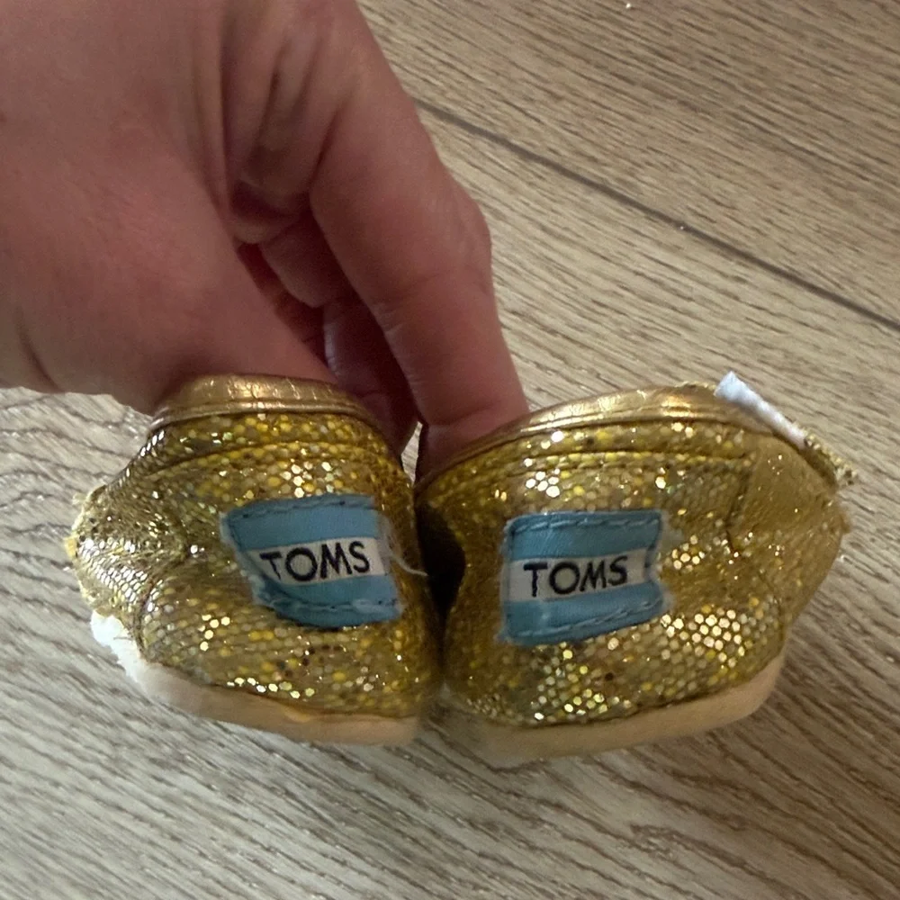 TOMS Toddler Sparkle Slip-On Shoes in Gold